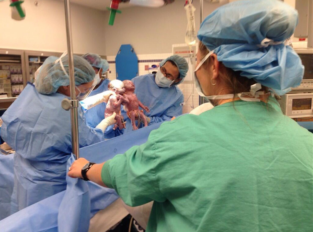 Newborn Twins, Holding Hands Newborn Twins, Holding Hands